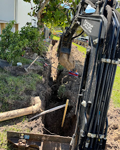 Excavator Sewer Line Dig — SW Florida